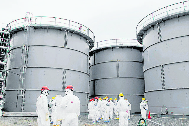 File photo of tanks of radiation-contaminated water at TEPCO's tsunami-crippled Fukushima Daiichi nuclear power plant in Fukushima prefecture