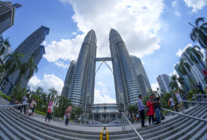 Tourist with Petronas Twin Towers