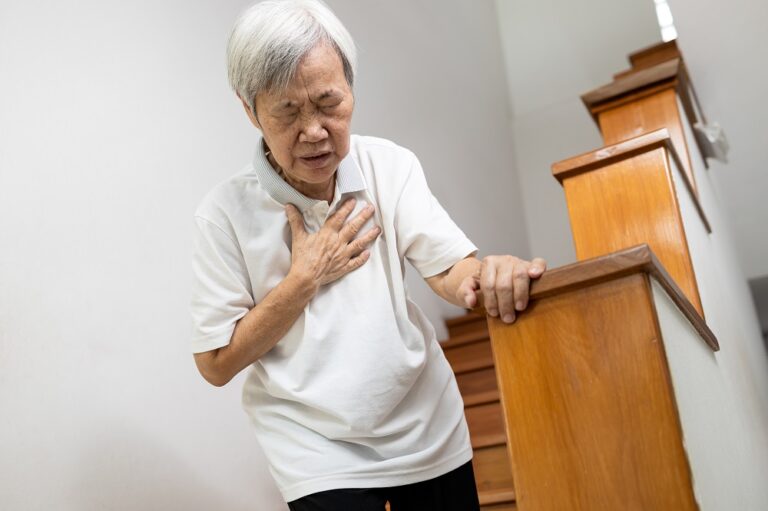 Asian senior grandmother suffering from pain in chest with acute
