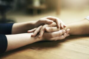 Small Gestures Of Kindness Go A Long Way. Closeup Shot Of Two Unidentifiable People Holding Hands In Comfort.